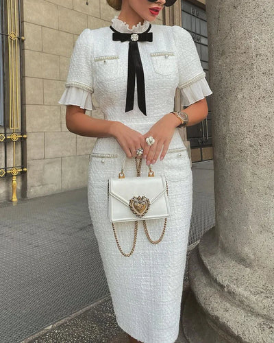 Elegant Round Neck Short Sleeve Bow Ruffle Hem Beaded White Dress