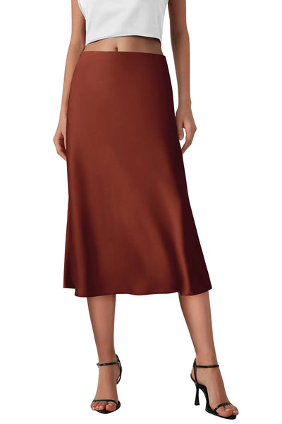 Brown skirt worn by a person on a white background
